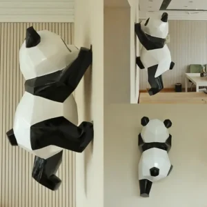 Geometric wall climbing panda sculpture