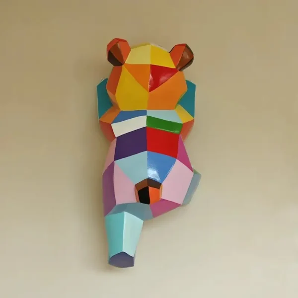 Geometric wall climbing panda sculpture