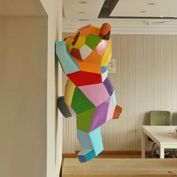 Geometric wall climbing panda sculpture